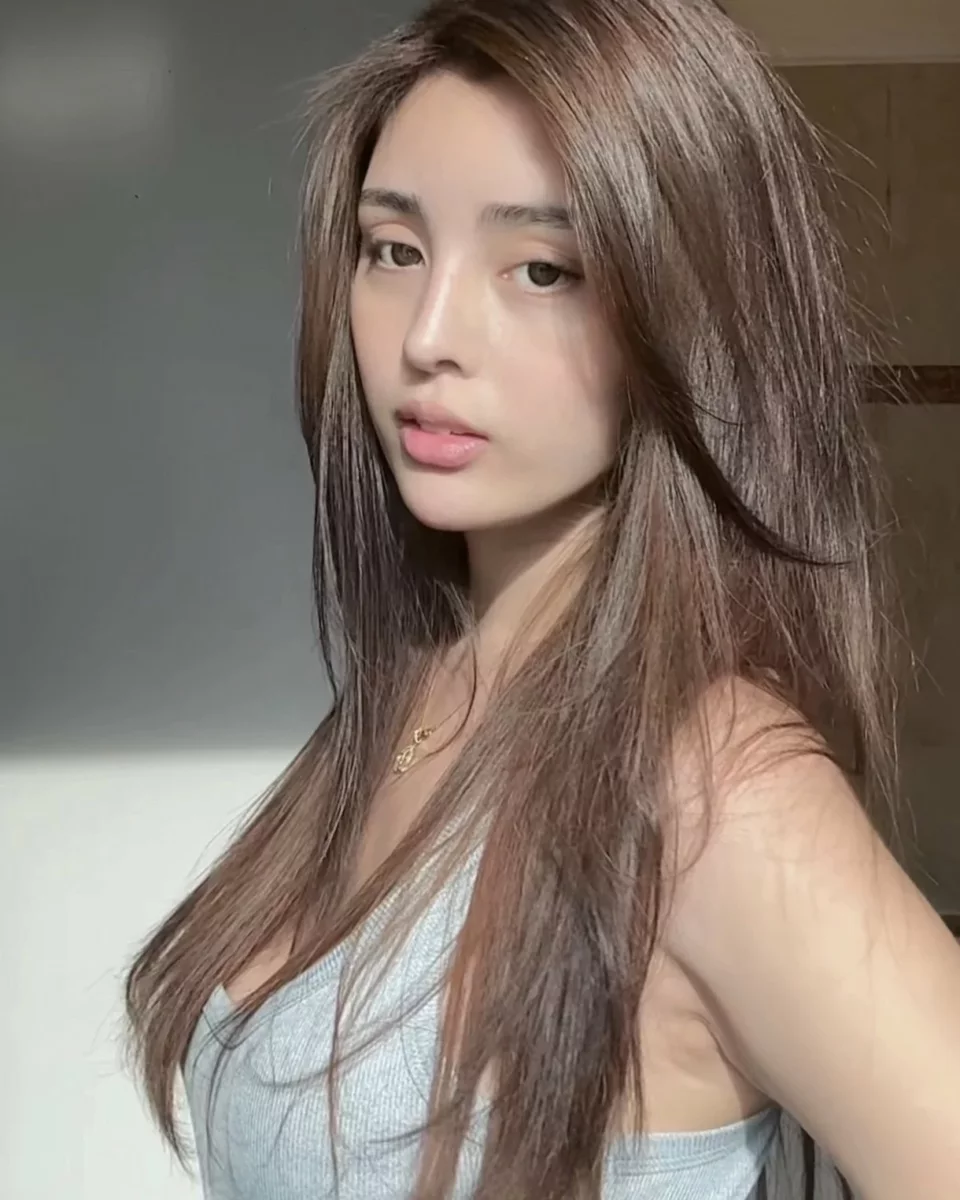 Private conversation between Malaysian escort and client in Singapore hotel lounge